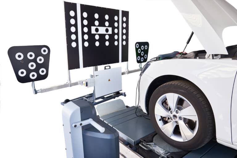 Calibration target boards positioned in front of a vehicle